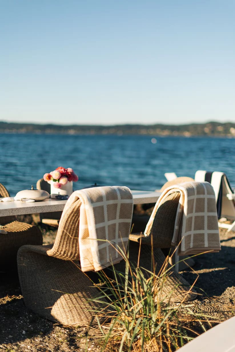 The Westerly Co Commodore blanket in soft cream and sand tones, is a perfect addition to a seaside picnic. It's beautiful, snuggly soft, and incredibly inviting indoors or out.