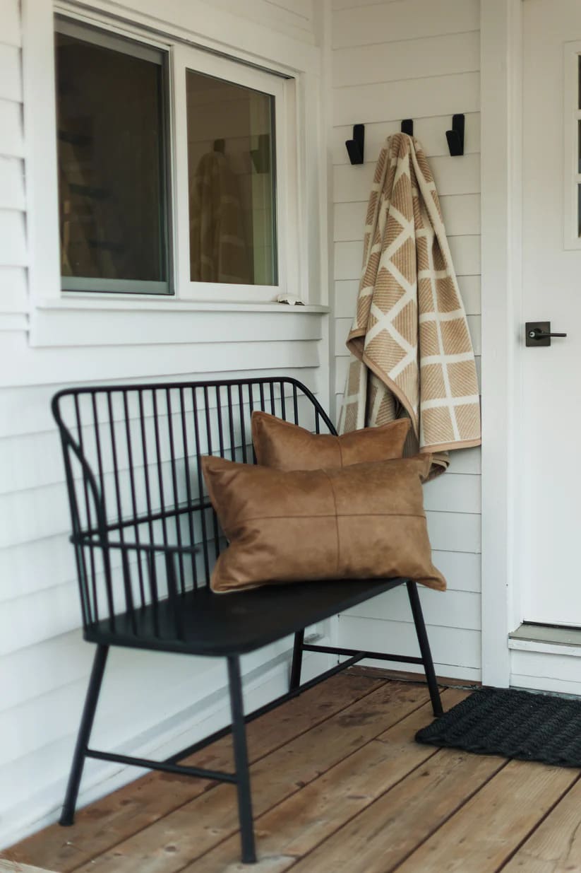 Warm up your porch with The Westerly Co Commodore blanket. The soft cream and sand tones layer perfectly with neutral color palettes.