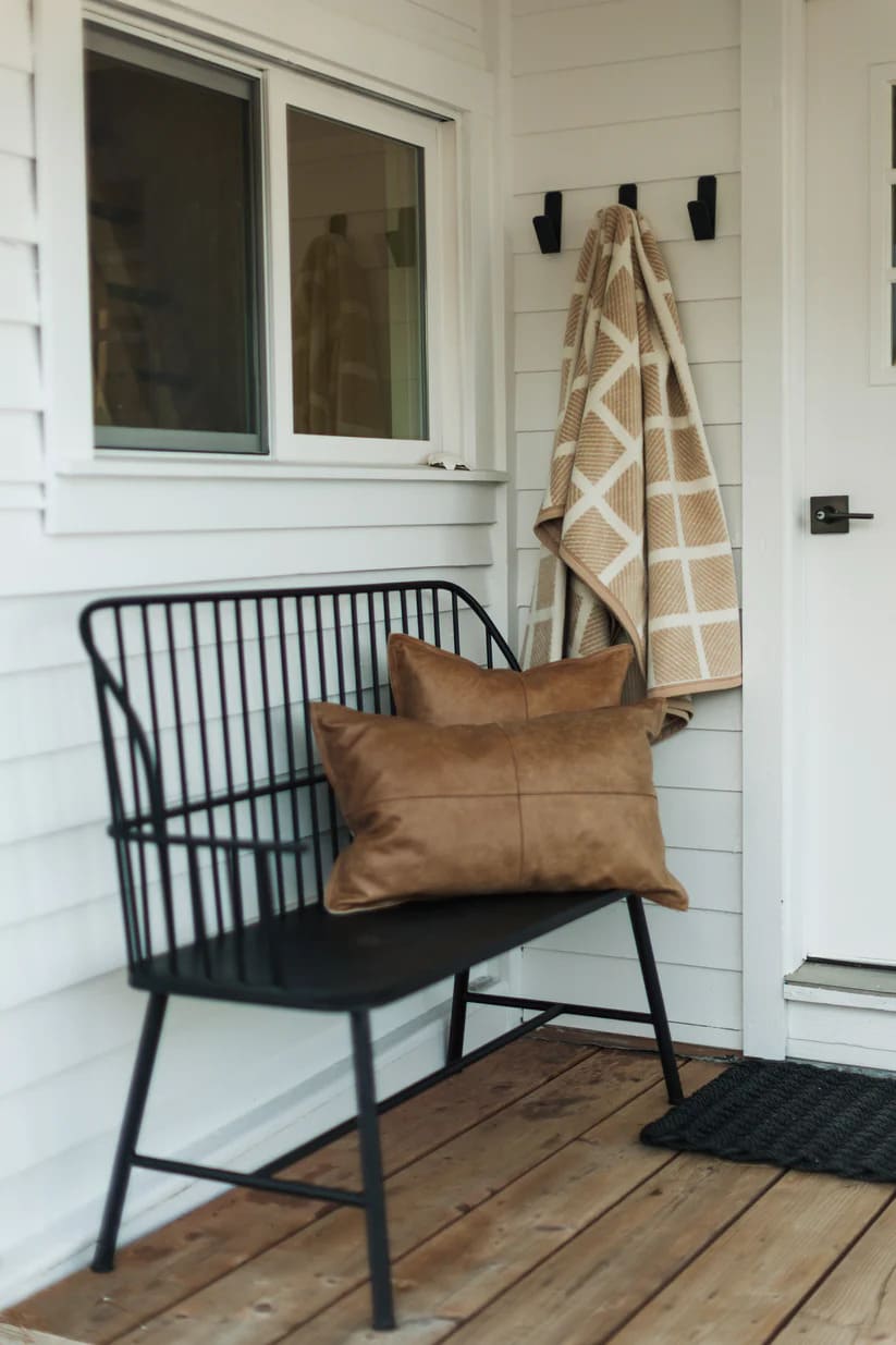 Warm up your porch with The Westerly Co Commodore blanket. The soft cream and sand tones layer perfectly with neutral color palettes. 