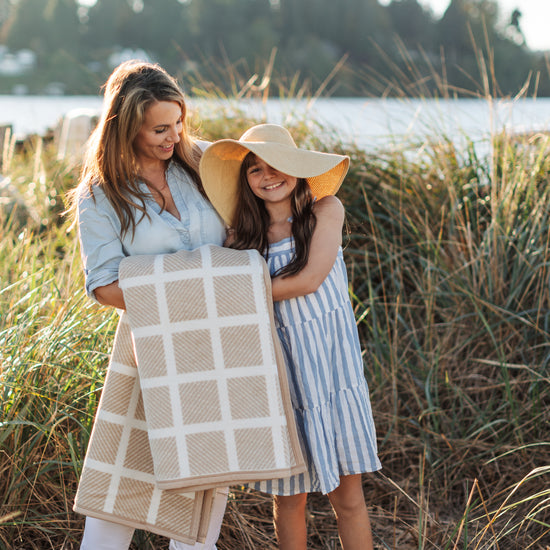 Wrap yourself, or a loved one, in the Westerly Co Commodore blanket. It's soft cream and sand tones are a perfect addition to a seaside picnic or just thrown over your favorite chair at home.